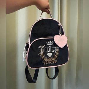 SOLD. Juicy Couture Licorice Heritage Backpack 
New with Tags
